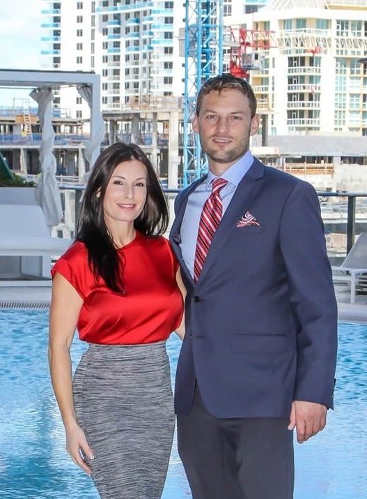 Olga and Jim Blackburn against the Miami skyline
